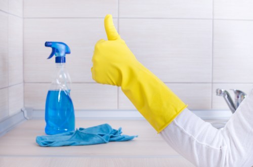 Preparing living room furniture for upholstery cleaning in Putney